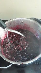 Mashing blackberries