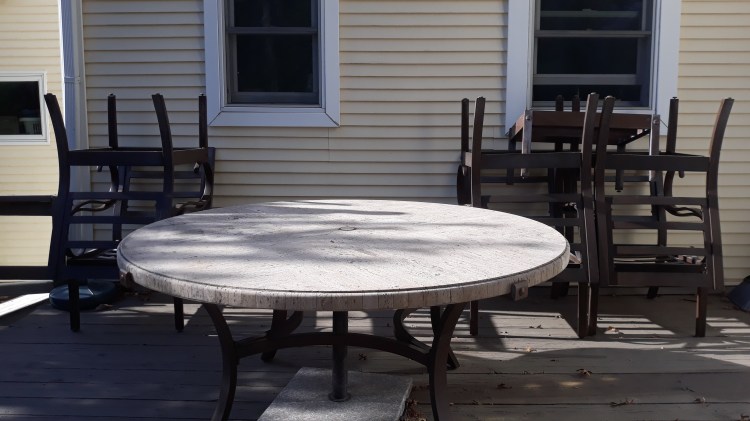 Deck furniture stacked and cushions stored for winter at Farm Charm